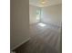 Bedroom features neutral walls, carpet, and one window bringing in natural light at 142 Vega Loop, Sanford, NC 27330