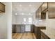 Kitchen with granite countertops and wooden cabinets at 142 Vega Loop, Sanford, NC 27330