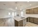 Granite countertops and wooden cabinets in a bright kitchen at 142 Vega Loop, Sanford, NC 27330
