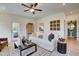 Living room with a comfortable sofa and access to a patio at 142 Vega Loop, Sanford, NC 27330