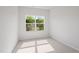 Bright bedroom with a window offering an outside view and neutral carpeting at 144 Fideaux Blvd # 251, Raleigh, NC 27603