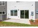 Backyard patio featuring sliding glass door, and green space at 148 Fideaux Blvd # 250, Raleigh, NC 27603