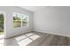 Bright bedroom with a large window and natural light at 148 Fideaux Blvd # 250, Raleigh, NC 27603