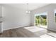 Dining area with sliding glass doors providing access to the outdoors at 148 Fideaux Blvd # 250, Raleigh, NC 27603