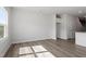 Open-concept living area with a closet and a view of the backyard at 148 Fideaux Blvd # 250, Raleigh, NC 27603