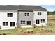 An aerial view of the backyard and patio at 152 Fideaux Blvd # 249, Raleigh, NC 27603