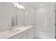 Bright bathroom with double sinks, a large mirror, and a shower-tub combination at 152 Fideaux Blvd # 249, Raleigh, NC 27603