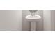 This is a pedestal sink in a bathroom at 152 Fideaux Blvd # 249, Raleigh, NC 27603