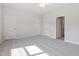 Spacious bedroom with neutral carpet, ceiling fan, and multiple closets for ample storage at 152 Fideaux Blvd # 249, Raleigh, NC 27603