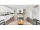 This kitchen has granite countertops, stainless steel appliances, and light cabinets at 152 Fideaux Blvd # 249, Raleigh, NC 27603