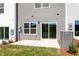 This patio is in the backyard and features a sliding glass door to access the house at 152 Fideaux Blvd # 249, Raleigh, NC 27603