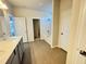 Large bathroom with a double vanity, a separate toilet area, and a shower/tub combo at 154 Vega Loop, Sanford, NC 27330