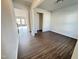 Spacious living room featuring beautiful wood floors and neutral walls at 154 Vega Loop, Sanford, NC 27330