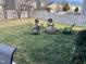 Spacious backyard with firepit and seating area at 1936 Sinclair Trce, Burlington, NC 27215