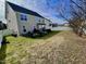 Large backyard with firepit, patio, and privacy fence at 1936 Sinclair Trce, Burlington, NC 27215
