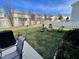 Backyard with firepit, patio, and grassy area at 1936 Sinclair Trce, Burlington, NC 27215