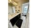 Shared bathroom with double vanity and tile floors at 1936 Sinclair Trce, Burlington, NC 27215