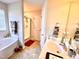 Bathroom features a double vanity, shower, and bathtub at 1936 Sinclair Trce, Burlington, NC 27215