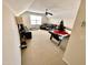 Bonus room featuring a sectional sofa, air hockey, and TV at 1936 Sinclair Trce, Burlington, NC 27215