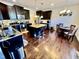 Kitchen with dark cabinets, granite countertops and an island at 1936 Sinclair Trce, Burlington, NC 27215