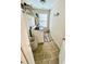 Laundry room with washer, dryer, and overhead shelving at 1936 Sinclair Trce, Burlington, NC 27215