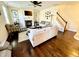 Living room with neutral colored couches, fireplace and hardwood floors at 1936 Sinclair Trce, Burlington, NC 27215