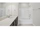 Bathroom with double vanity, tub, and tile at 21 Nettle Ln # 252, Clayton, NC 27520