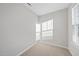 Small bedroom with neutral walls and carpet at 21 Nettle Ln # 252, Clayton, NC 27520