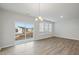 Spacious dining area with hardwood floors and patio access at 21 Nettle Ln # 252, Clayton, NC 27520