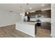 Modern kitchen with stainless steel appliances and granite countertops at 21 Nettle Ln # 252, Clayton, NC 27520