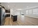 Open concept kitchen with island and stainless steel appliances at 21 Nettle Ln # 252, Clayton, NC 27520