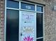 Bradley's Yoga & Fitness studio entrance with signage and hours at 2225 Gathering Square Ct # 2225, Fuquay Varina, NC 27526