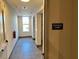 Clean and bright elevator lobby with tiled floors at 2225 Gathering Square Ct # 2225, Fuquay Varina, NC 27526