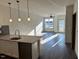Modern kitchen with stainless steel appliances and granite countertops at 2225 Gathering Square Ct # 2225, Fuquay Varina, NC 27526