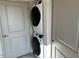 Stackable washer and dryer in convenient laundry closet at 2225 Gathering Square Ct # 2225, Fuquay Varina, NC 27526