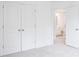 Bedroom with double door closet and access to bathroom at 272 Sweetbay Tree Dr, Wendell, NC 27591
