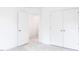 Bright bedroom with double door closet and access to hallway at 272 Sweetbay Tree Dr, Wendell, NC 27591