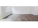 Bright dining room with hardwood floors and sliding glass door at 272 Sweetbay Tree Dr, Wendell, NC 27591