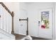 Staircase and entry door with view of the street at 272 Sweetbay Tree Dr, Wendell, NC 27591