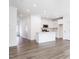 Open concept kitchen with white cabinets and island at 272 Sweetbay Tree Dr, Wendell, NC 27591