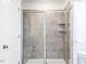 Large walk-in shower with glass enclosure and built-in seat at 272 Sweetbay Tree Dr, Wendell, NC 27591