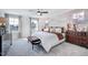 Spacious main bedroom with carpeted floor and large windows at 274 Sweetbay Tree Dr, Wendell, NC 27591