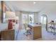 Bright home office with large windows and built-in desk at 274 Sweetbay Tree Dr, Wendell, NC 27591