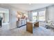 Home office with a desk and two chairs near another bedroom at 274 Sweetbay Tree Dr, Wendell, NC 27591