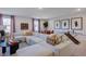 Spacious rec room with sectional sofa and game table at 274 Sweetbay Tree Dr, Wendell, NC 27591