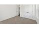 Bright bedroom with carpeted floors, closet and natural light from the window at 30 Rosewood Ln, Youngsville, NC 27596