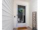 Front door entrance with a wreath and welcome mat at 3018 E Cotton Gin Dr, Clayton, NC 27527