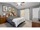 Main bedroom with barn door to en-suite bathroom at 3018 E Cotton Gin Dr, Clayton, NC 27527