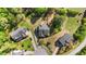 Aerial view of home and neighborhood with mature trees and landscaped yards at 3308 Eden Grove Rd, Fuquay Varina, NC 27526