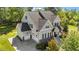 Charming home with attached three-car garage and a well-manicured lawn at 3308 Eden Grove Rd, Fuquay Varina, NC 27526